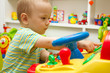 Baby Playing With The Toys
