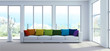Sofa mit Regenbogen Kissen in Strandvilla