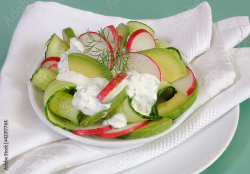 Photo: Cucumber salad with radish and avocado cream sauce Cucumber salad with radish and avocado cream sauce