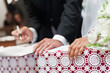 husband signing for weddining