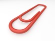 close up render of a red paper clip with depth of field