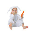 Child dressed as a rabbit with a carrot