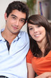 Head and shoulders of a young attractive couple