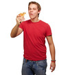 portrait of young man eating pizza portion over white backgorund