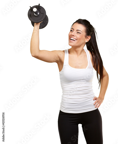 Photo: portrait of young girl training with weights over white backgrou portrait of young girl training with weights over white backgrou