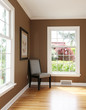 Photo: Living room corner with chair and two windows. Living room corner with chair and two windows.