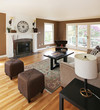 Photo: Brown livinng room with white fireplace and luxury furniture. Brown livinng room with white fireplace and luxury furniture.