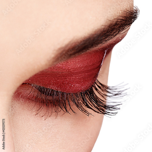 Photo: Woman eye with long eyelashes. High quality image Woman eye with long eyelashes. High quality image