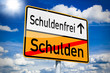 Ortseingangsschild mit Schuldenfrei und Schulden