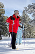 Old couple skiing together
