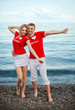 Portrait of young happy smiling cheerful attractive couple toget