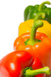 Photo: Color peppers on a white background. Color peppers on a white background.