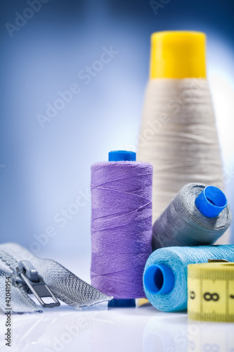 Photo: sewing items on the white table sewing items on the white table