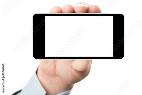 Photo: Hand holding smartphone with a blank screen Hand holding smartphone with a blank screen