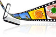 Pellicola film su sfondo bianco e PC portatile