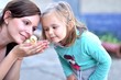 Photo: Happy girl with her little chicken Happy girl with her little chicken