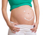Bauch einer Schwangeren mit Smiley