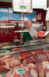 Butcher presenting ground meat