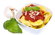 Tortellini in a bowl isolated on white