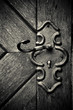 Photo: Retro keyhole in old wooden door Retro keyhole in old wooden door