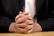 Foto: woman holding hands folded for prayer woman holding hands folded for prayer