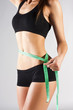 Woman measuring perfect body, healthy lifestyles concept