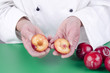 Foto: female chef with a divided plum female chef with a divided plum