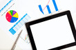 tablet on the table of graphs