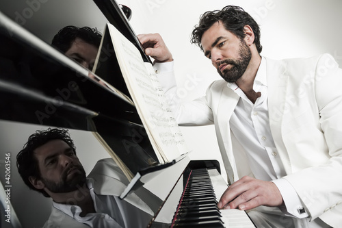 Photo: man with piano man with piano
