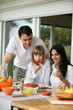 Photo: Family at breakfast Family at breakfast