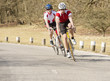 Cyclists Riding On A Country Road