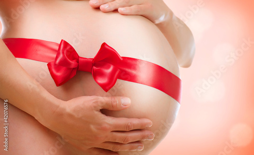 Photo: Pregnant Belly. Pregnancy Pregnant Belly. Pregnancy