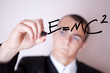 Photo: man writes mathematical formula man writes mathematical formula