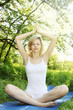 Woman meditating on nature