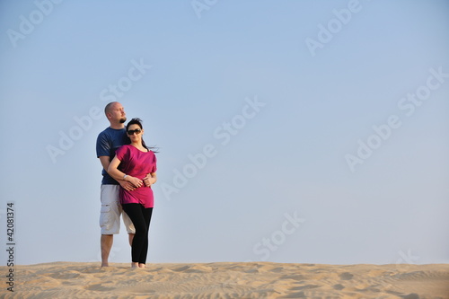 Photo: couple enjoying the sunset couple enjoying the sunset