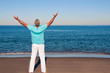Man with arms outstretched