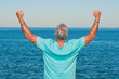 Man with a gesture of success