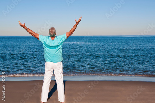 Photo: Man with arms outstretched Man with arms outstretched