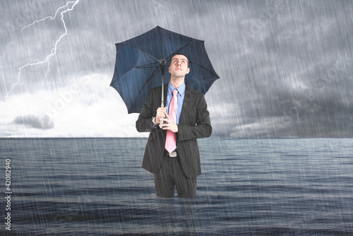Photo: Businessman under the rain Businessman under the rain