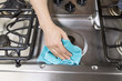Wiping down Stove top Range
