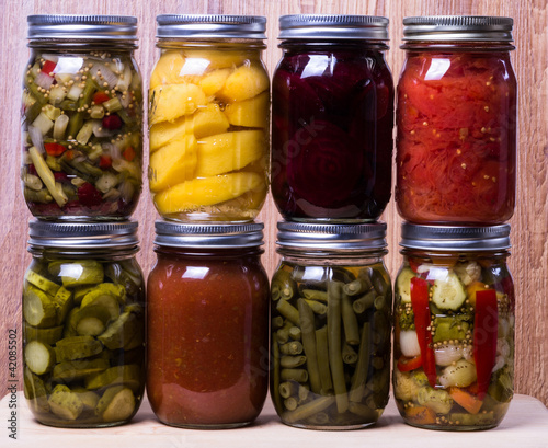 Photo: Group of fresh homemade preserved vegetables and fruits Group of fresh homemade preserved vegetables and fruits