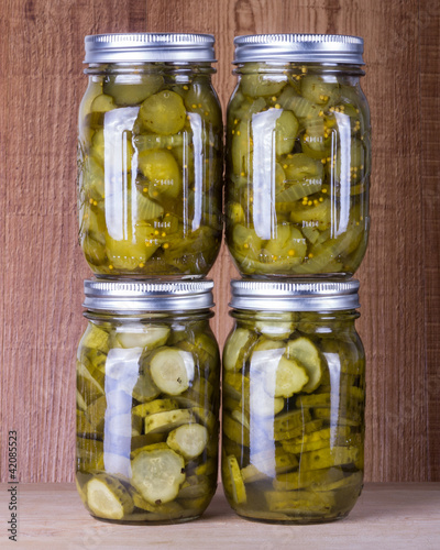 Photo: Pickled cucumbers in brine in mason jars Pickled cucumbers in brine in mason jars