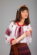 Foto: Attractive woman wears Ukrainian national dress Attractive woman wears Ukrainian national dress