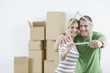 Young couple moving in new home