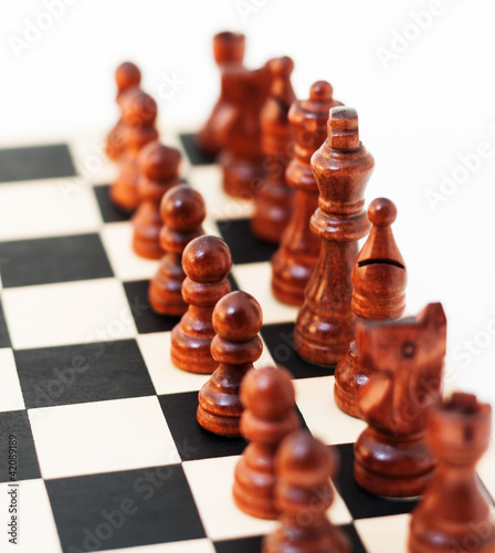 Photo: The black pieces on a chest board ready for the game The black pieces on a chest board ready for the game