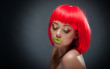Foto: Cute young feamle with colourful makeup and red hair Cute young feamle with colourful makeup and red hair