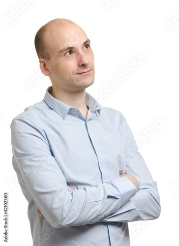Photo: Portrait of pensive man looking up Portrait of pensive man looking up