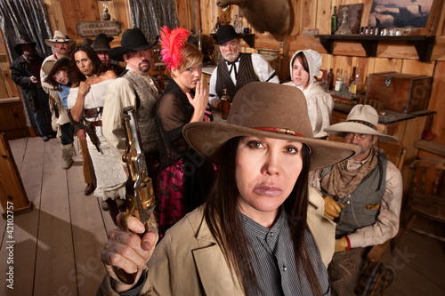 Photo: Dangerous Cowgirl in Old Saloon Dangerous Cowgirl in Old Saloon