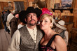 Foto: Tough Cowboy and Showgirl in Saloon Tough Cowboy and Showgirl in Saloon