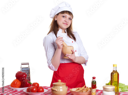 Photo: attractive woman cooking attractive woman cooking
